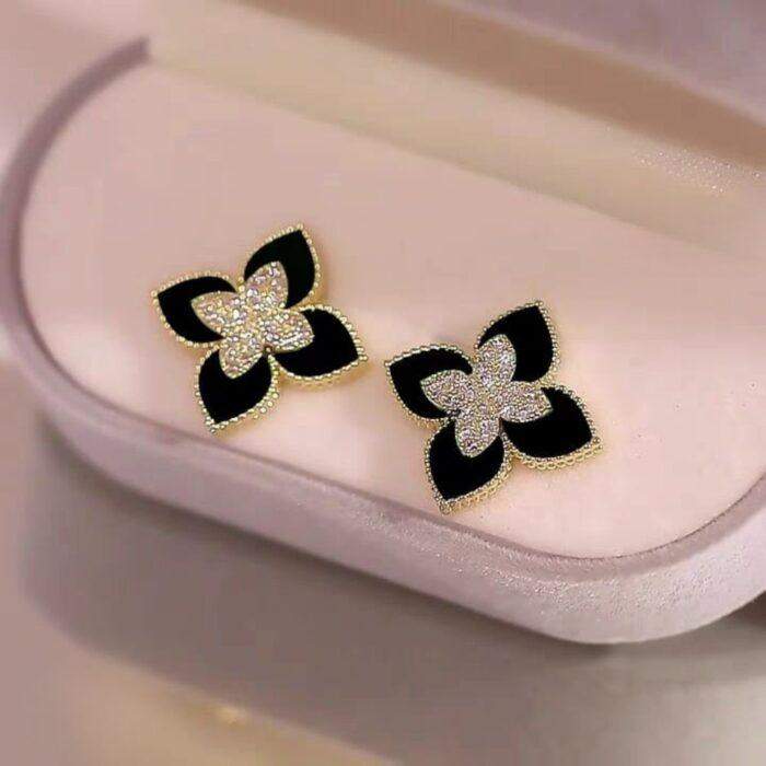 Black and Gold Floral Earrings Elegant Four-Petal Studs with Black Enamel, Cubic Zirconia & Super Gold-Tone A1 Detailing - Image 4