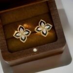 Black and Gold Floral Earrings Elegant Four-Petal Studs with Black Enamel, Cubic Zirconia & Super Gold-Tone A1 Detailing - Image 3
