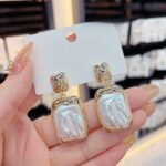 Elegant Korean Gold Foil Earrings with White Stone - Image 2