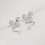 Tangled Korean Pearl Earrings, Twisted Butterfly Design - Image 5