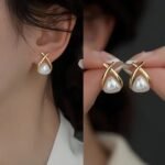 Trendy Korean Cross Pearl Earrings, Sculpted Design - Image 3