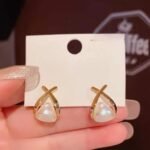 Trendy Korean Cross Pearl Earrings, Sculpted Design - Image 4